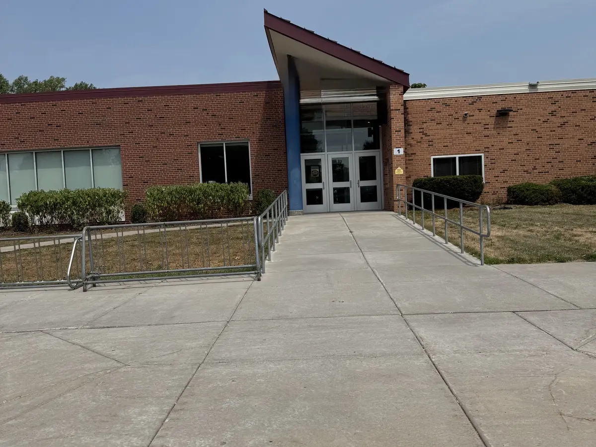 Front entrance and ramp of a brick elementary school in Blaine on a clear day
