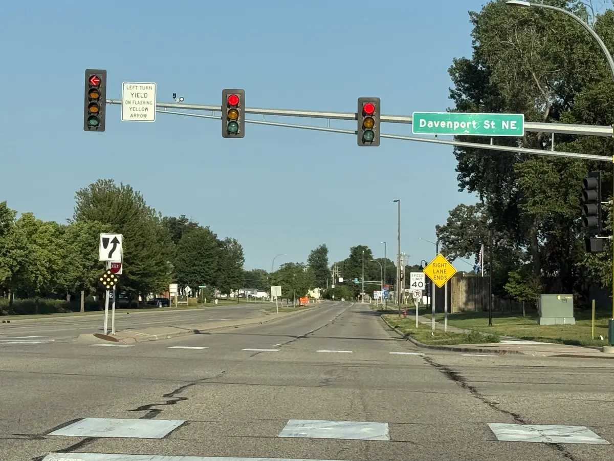 Davenport Street NE sign above a Blaine intersection with traffic signals