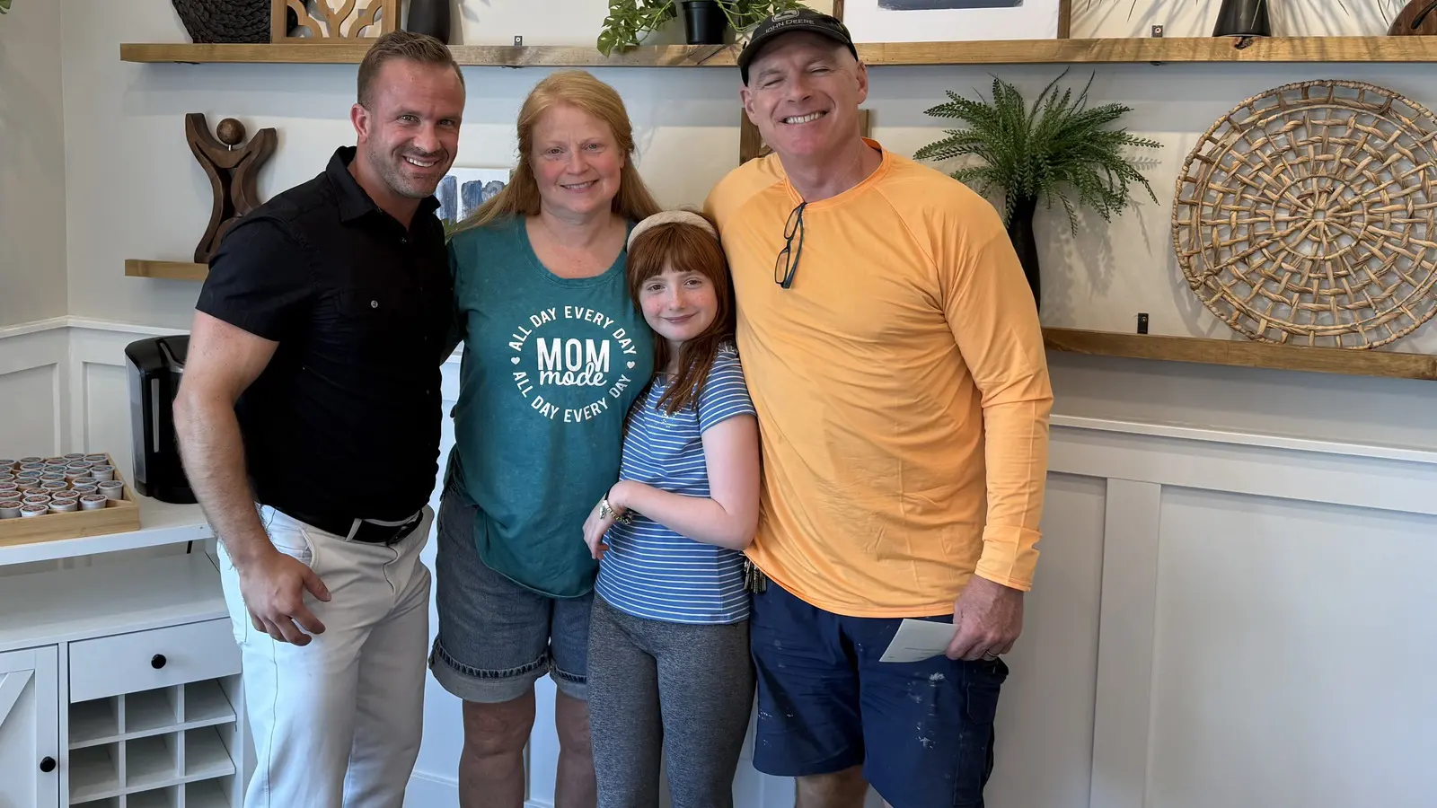 A family at the closing table on the day they got their keys