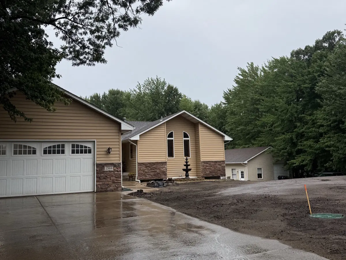 A newly graded lot with a home under construction in Blaine