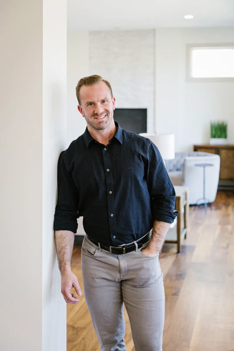 Nick Bock standing in the entryway of a bright Blaine home